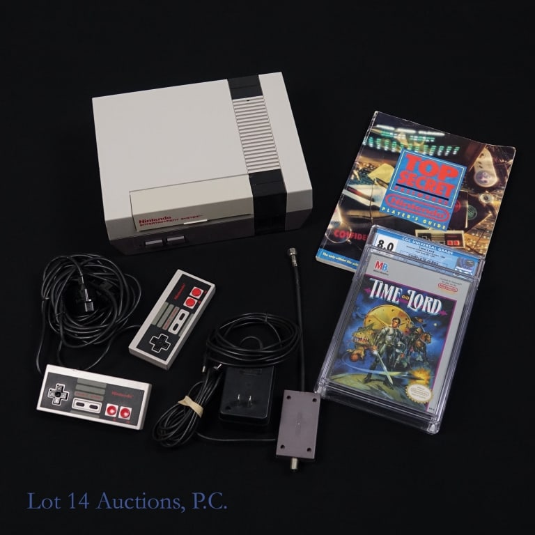 NES Video Game Console (W/ Time Lord CGC 8.0): Nintendo Entertainment System Video Game Console (With Time Lord (Graded CGC 8.0 - Complete In Box). Also includes (2) controllers, cables to power the console, and Top Secret Passwords Nintendo Playe