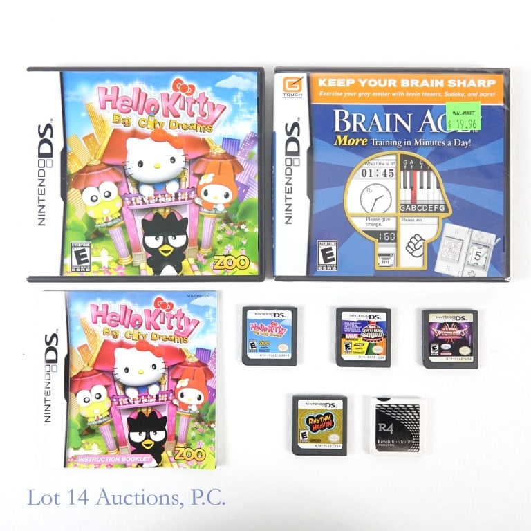 Nintendo DS Video Games (6 Total - 1 Sealed): Nintendo DS Video Games (6 Total - 2 In Box - 1 Sealed). Includes: Brain Age (Factory Sealed), Hello Kitty Big City Dreams (CIB), Rhythm Heaven (Cartridge Only), R4 Revolution For DS (Cartridge Only),