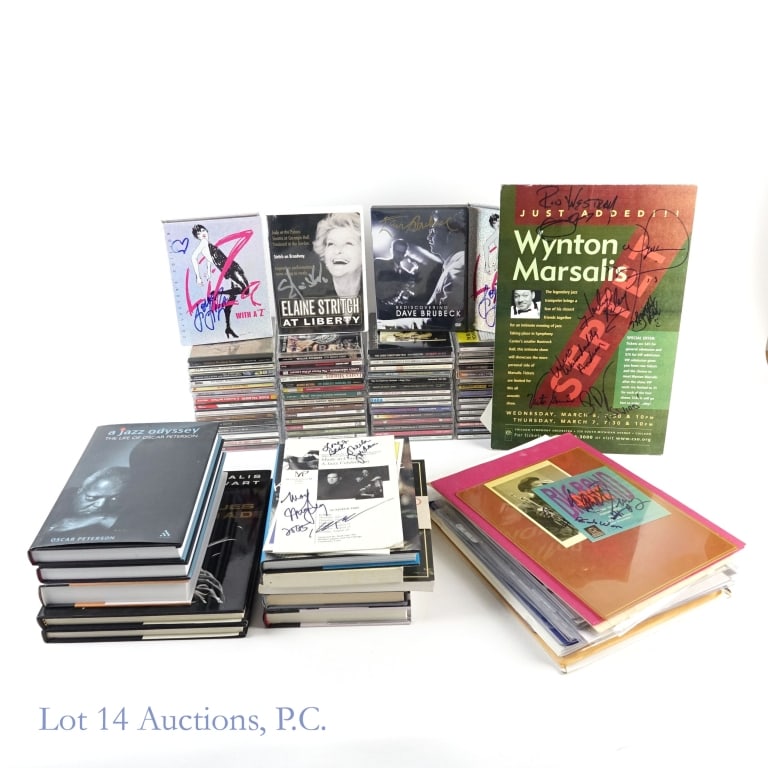 Autographed Jazz & Entertainment Memorabilia (+70): Autographed Jazz & Entertainment Memorabilia (+70). Large assortment of signed CDs, books and other entertainment ephemera. Some dents, dings and smudges are present. See photos for more details. This