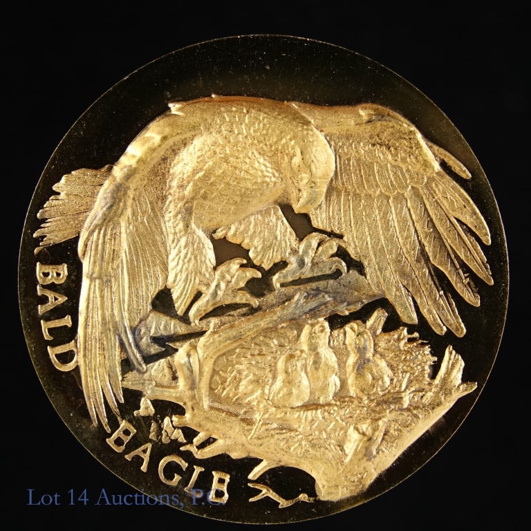Bald Eagle Silver Round (w/ 24kt Gold E.P.): Stunning Bald Eagle 24 karat gold EP silver round (Wittnauer Mint - New Rochelle NY).) One of the Longine Symphonette endangered wildlife series. Serial numbered 239. Round has intricate detailing. Ed