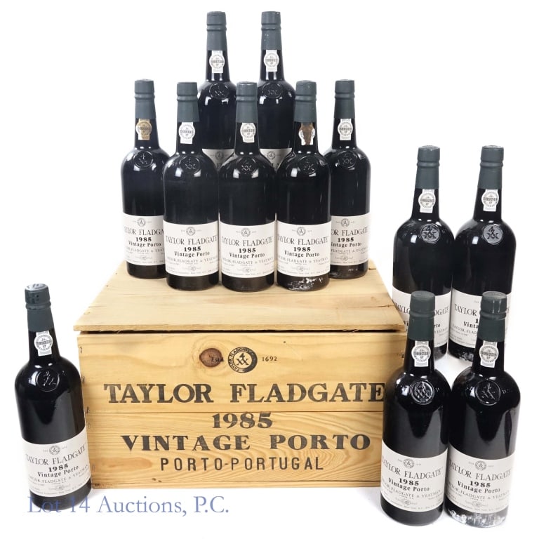 1985 Taylor Fladgate Vintage Port (Full Crate): 12 bottles total in this lot. Full crate of 1985 Taylor Fladgate Vintage Port, 750 ml. Crate is 2.25 Gallons (9 Liters). Crate was sealed in our possession and only just opened to take photos. Please 