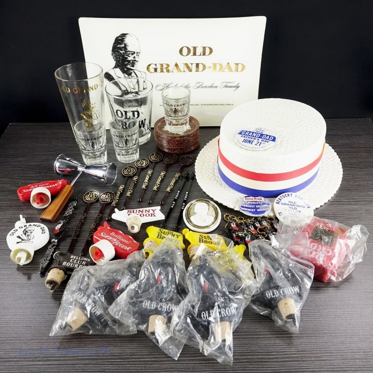 Old Crow and Old Grand-Dad and other Bar Materials: This lot contains a variety of bar materials from classic distilleries such as Old Grand-Dad, Old Crow, and Sunny Brook. Materials include three Old Crow shot glasses, one Old Crow drinking glass, and