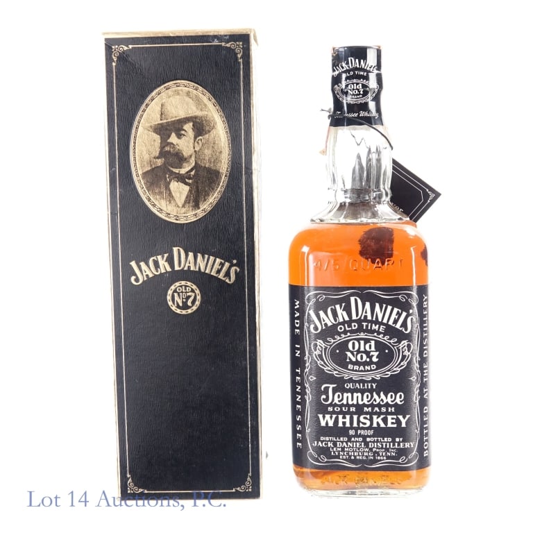 "74" Jack Daniel's Tennessee Whiskey (4/5 Quart): Jack Daniel's Tennessee Whiskey, 90 Proof, 4/5 Quart, early 1960s-late 1970s tax strip, "74" glass molding. Tax strip in good condition with little to no tears and minor stains. Please see photos for 