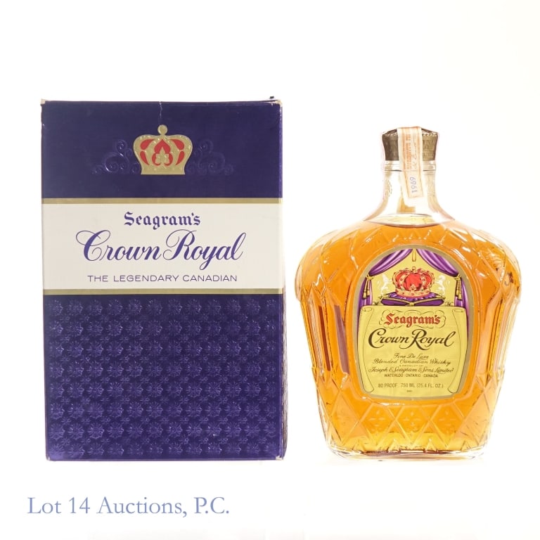 1969 Crown Royal Fine De Luxe Canadian Whisky: Crown Royal Fine De Luxe Canadian Whisky, 80 Proof, 750 ml, Distilled: 1969, Tax strip torn at one end but in fair condition overall. Please see photos for additional details. Original box and bag inc