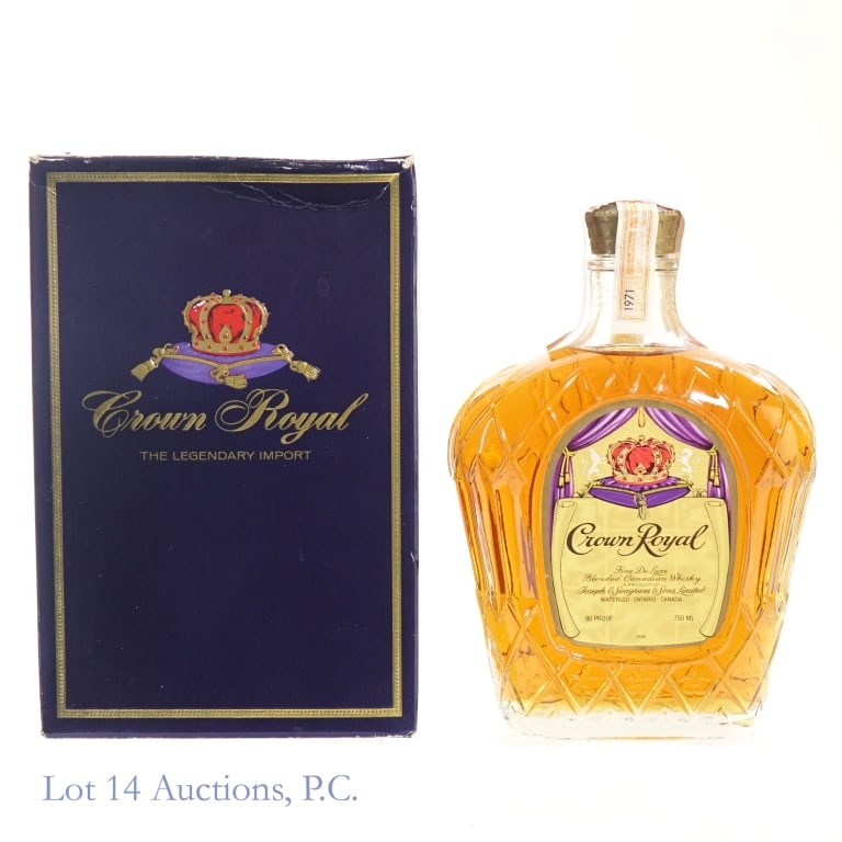 1971 Crown Royal Fine De Luxe Canadian Whisky: Crown Royal Fine De Luxe Blended Canadian Whisky, 80 Proof, 750 ml, Distilled: 1971, Tax strip in fair condition with only minor tears. Original box and bag included.