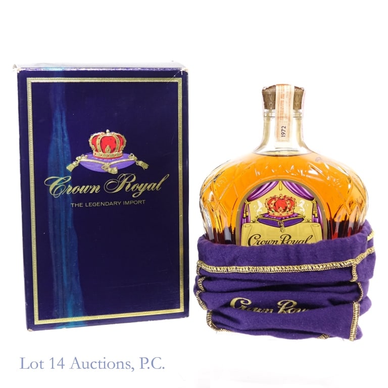 1972 Crown Royal Fine De Luxe Canadian Whisky: Crown Royal Fine De Luxe Canadian Whisky, 80 Proof, 750 ml, Distilled: 1972, Tax strip in fair condition with only minor tears. Box and bag included.