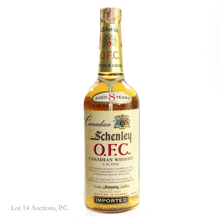 1970 Schenley 8 Year Blended Canadian Whisky: Schenley 8 Year Blended Canadian Whisky, 86.8 Proof, 750 ml, Distilled: 1970. Tax strip stained and slightly worn but intact overall.