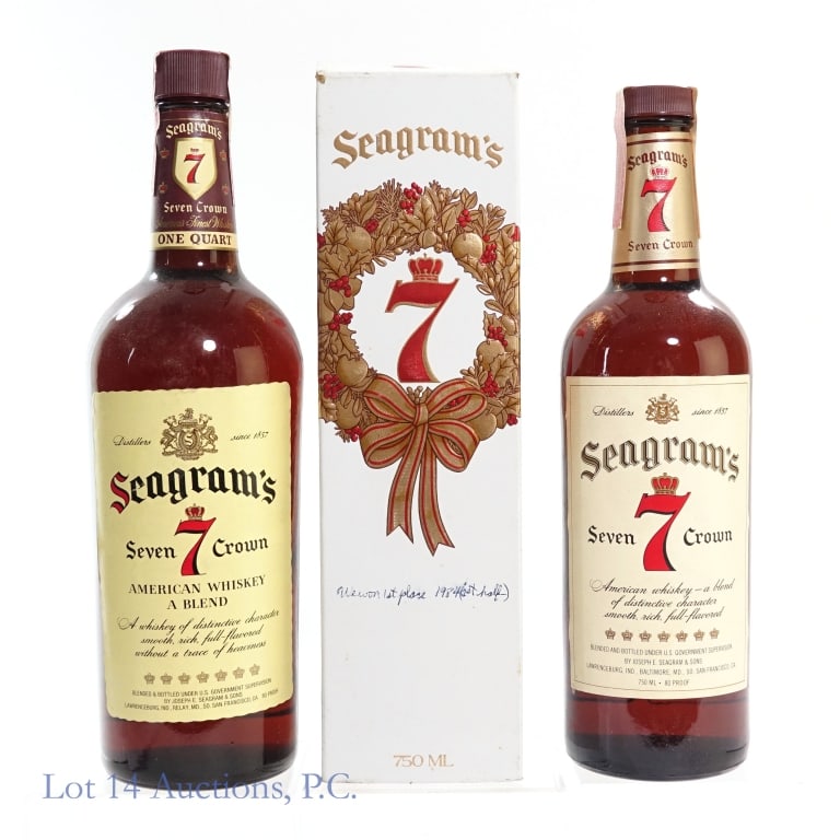 Seagram's 7 Crown Blended American Whiskey (2): 2 bottles total in this lot. 1-Seagram's 7 Crown Blended American Whiskey, 80 Proof, 1 Quart, late 1970s-early 1980s bottling. Tax strip badly worn but intact overall. 2-Seagram's 7 Crown Blended Amer