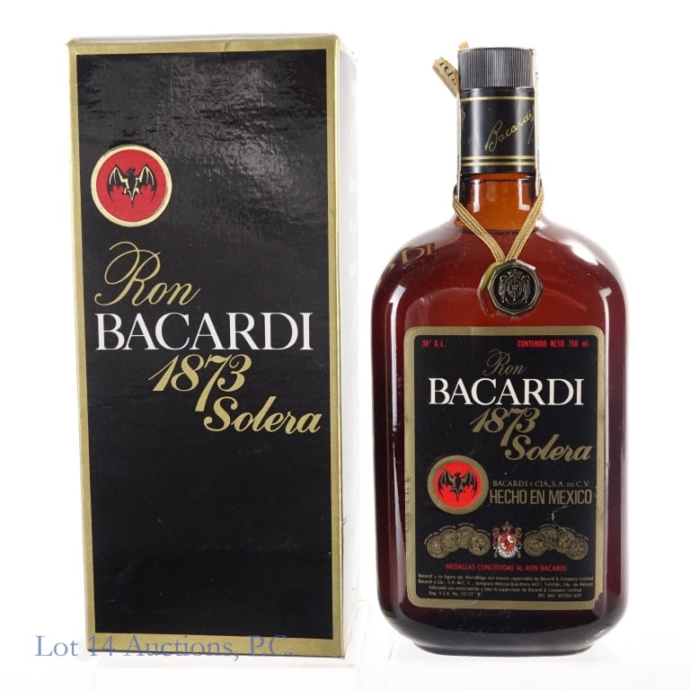 1990s/2000s Bacardi 1873 Solera Rum: Bacardi 1873 Solera Rum, 76 Proof, 750 ml, estimated to have been bottled in the 1990s- early 2000s. Paper seal torn and slightly discolored but intact overall. Medallion partially dislocated but stil