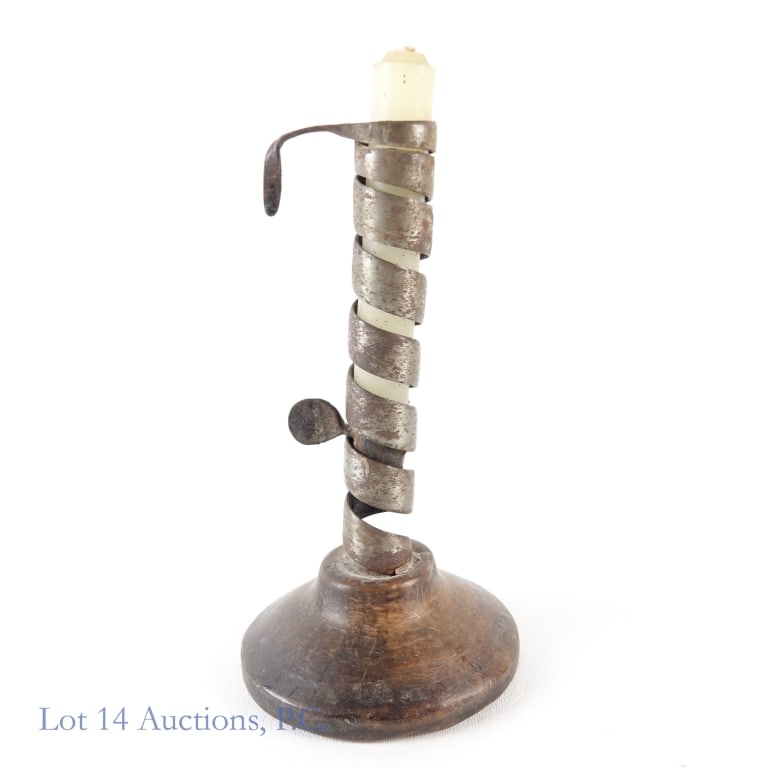 Steel & Beech Wood Spiral Candlestick 18 c.: Steel & Beech Wood Spiral Candlestick 18/19th c. 7.5" x 4" steel spiral candlestick with beech wood base circa 18th century. Candle also included, not believed to be that old. Item shows wear appropri