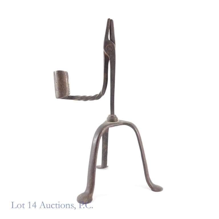 Hand Forged Iron Rush Light: Hand Forged Iron Rush Light. 9.75" wrought iron rush light with candle holder circa 17th / 18th century. Item shows some age, but well constructed and moves freely. See photos for more details.