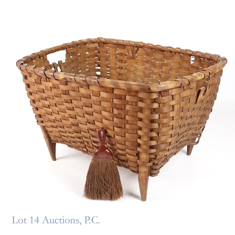 Large Weaved Shaker Basket: Large Weaved Shaker Basket. 29" x 19" x 14.5" weaved wooden basket on legs from the Shaker community, an offshoot of the Quakers. Deaccession numbers SM1966.48 in red paint. Some weaving has broken bu