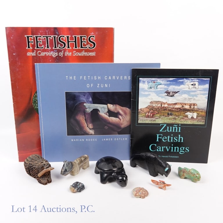 Zuni Fetish Carvings, Books, Dan Quam Jr. (11): Zuni Fetish Carvings, Books, Dan Quam Jr. (11). An assortment of (7) seven stone and (1) one wood Zuni Fetish Carvings ranging from .5" x 1.75" to 2.5" x 4". Bear with Fish in Mouth signed "Dan Quam J