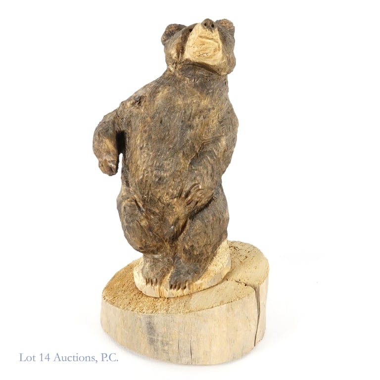 Tim Curley (1920's-1991) Carved Bear: Tim Curley (1920's-1991) Carved Bear. 13" x 8" x 7" (including base) carved wood bear signed by North Syracuse artist Tim Curley, dated "1988" with "Teton Village". Natural cracks in wood on right arm