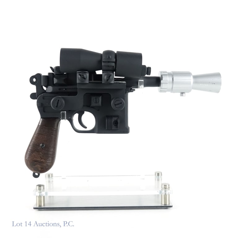 Star Wars Han Solo Replica DL - 44 Gun: Includes a replica of Han Solo's DL - 44 Gun with a stand. the gun is approximately 11.5" by 7.25" and is 3 pounds and 6 ounces.