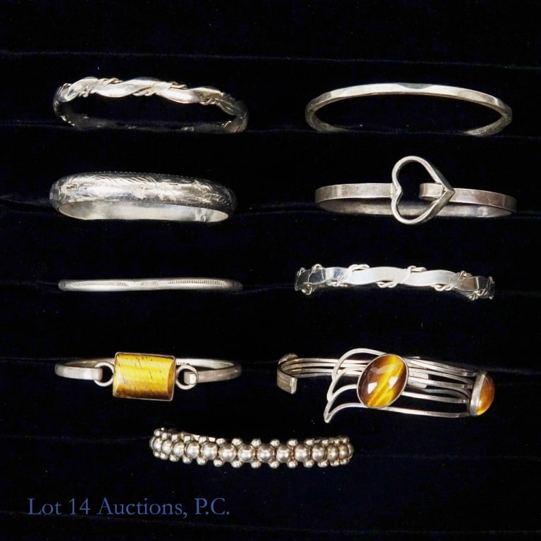 Sterling Silver Bangle / Cuff Bracelets (9): 9 sterling silver bracelets - bangle / cuff style. All marked "925", "sterling", or equivalent. Total weight: 159.8 grams.