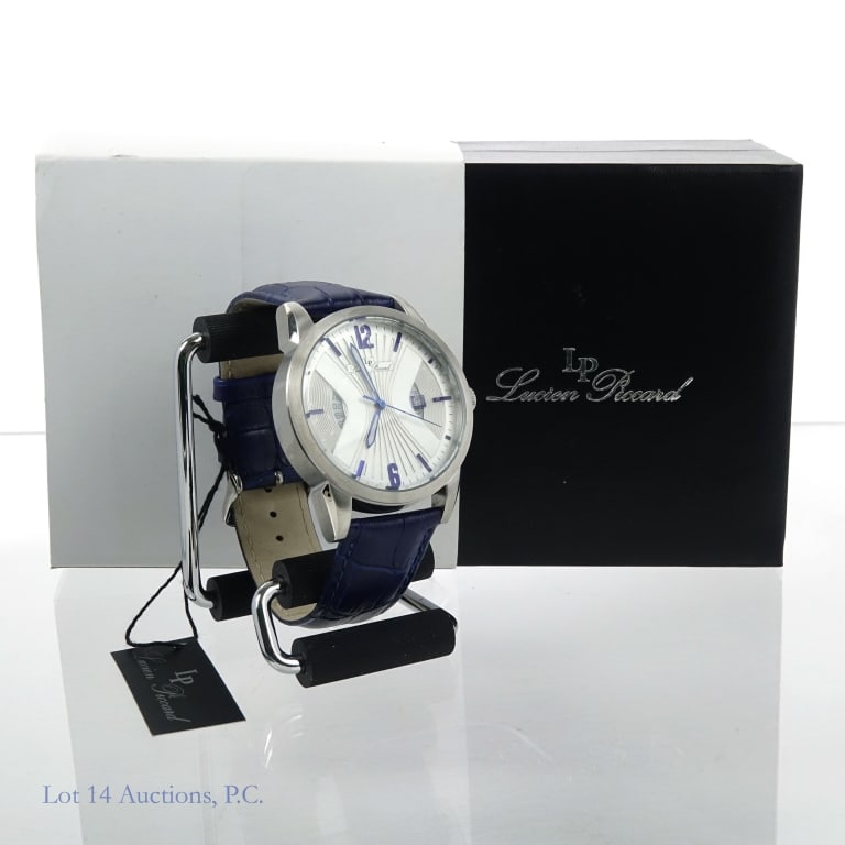 Lucien Piccard Men's Watch (NIB): Lucien Piccard men's wrist watch. Model # LP11561-02S. Silvery-white face with cobalt blue numbers & markers, outlined hands and leather strap. Original box and sleeve.