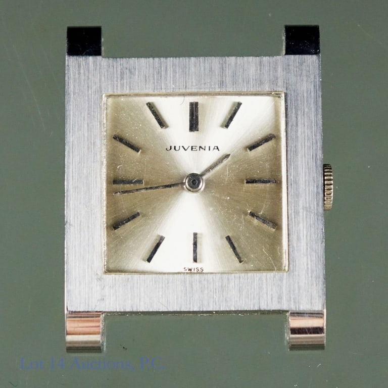 Juvenia Wrist Watch - Stainless Steel (No Strap): Juvenia wrist watch. No strap. Back stamped "691363". Approximate dimensions: Width: 24.0 mm. Lug to Lug: 31 mm. Lug width: 17.1 mm. Thickness: 6.1 mm. Stainless steel case.