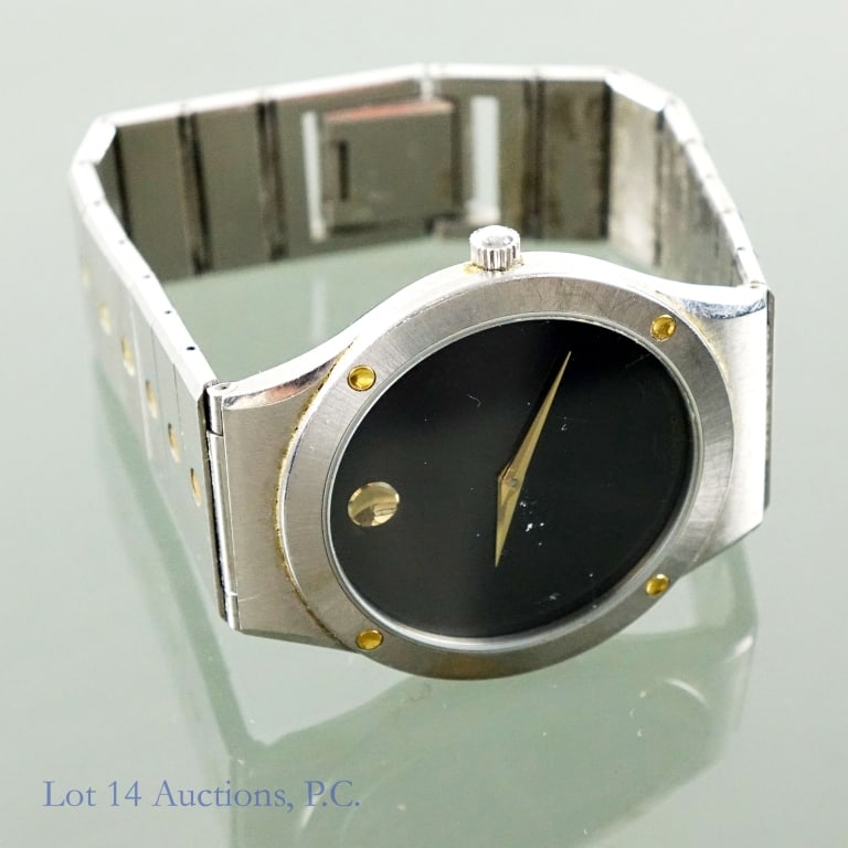 Movado Museum Watch: Movado Museum wrist watch. Back stamped: "86-A2-876L" and "997720". Approximate dimensions: Case: 31.9 mm. Thickness 5.6 mm. Discoloration on back of strap. Several scratches on crystal.