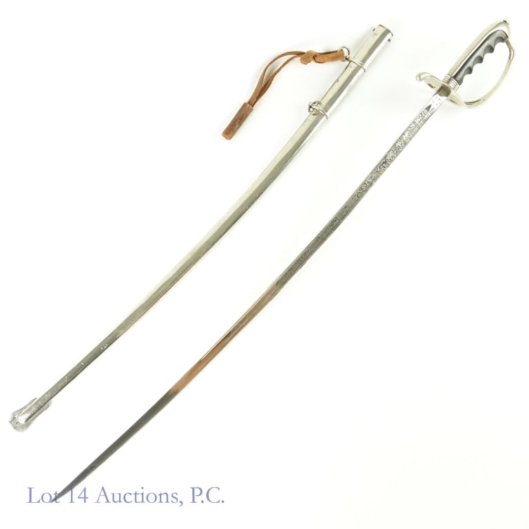 M1902 Officer's Sword - MODERN: M1902 Officer's ceremonial sword. Made in the USA by Colonial. Large "17" stamped over the maker's mark on ricasso, and an identical "17" stamped at the bottom of the metal scabbard. Blade is approxim