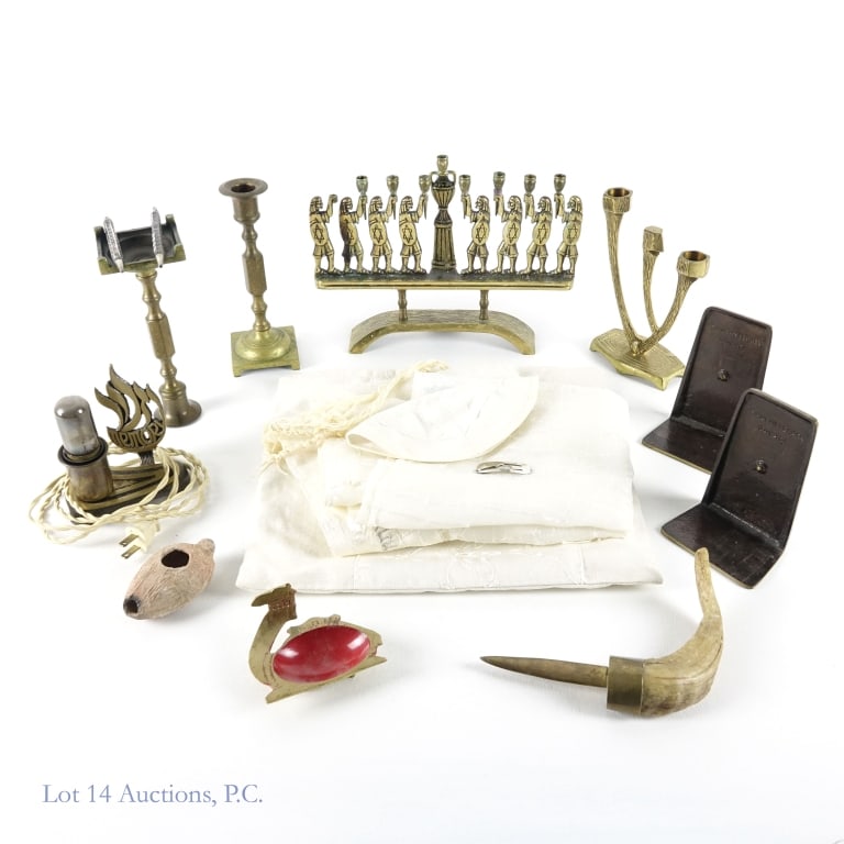 Oil Lamp, Menorah, Hannukia, Bookends Judaica, Sterling Silver Pens: Collection of Judaica, including clay oil lamp in brass camel holder, pair of brass candlesticks (7.25" tall), Waimberg Shin candle holder, Ram's horn letter opener, Dayagi brass bookends (Made in Isr