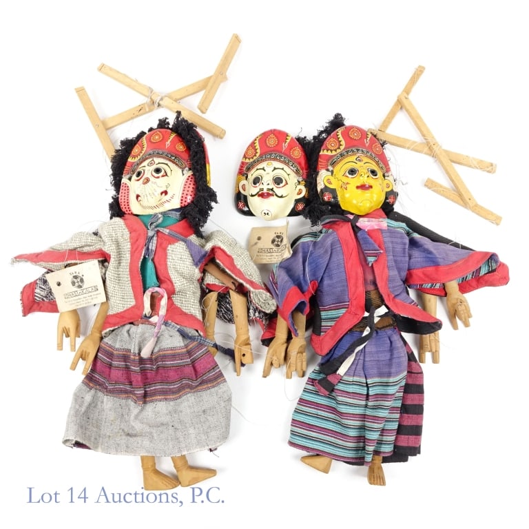 Nepalese Two Sided Dancing Marionettes (2): 2 Nepalese two sided marionettes depicting two separate figures, both have hand painted Paper Mache faces and wooden arms and legs. Each marionette is wearing traditional style clothing with two sets 