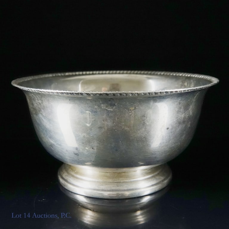 Hunt Silver Company Sterling Silver Revere Bowl (4.7ozt): Sterling silver Revere-style bowl. Hunt Silver Company makers mark, also marked "sterling 105". Weight: 146.0 grams. 2.5" tall, Approximately 4-7/8" diameter. Signs of wear and tarnish.
