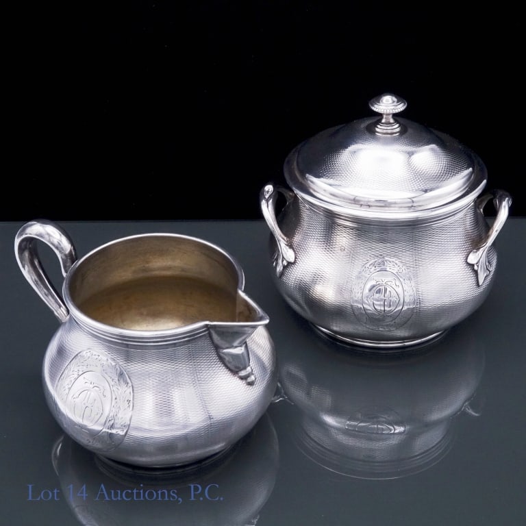 Odiot A Paris Sterling Silver Cream, Sugar (2 pcs): Sterling silver creamer and sugar bowl with lid. Both pieces stamped "Odiot AParis". Bot have the "O" above lamp in diamond mark. The creamer is stamped "3960" and the sugar bowl is stamped 4498. Suga
