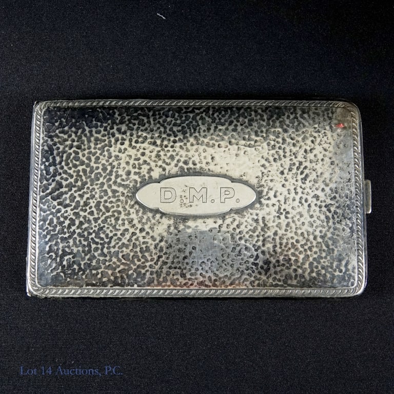 Webster Company Sterling Silver Cigarette Case (Engraved) (4.5ozt): Webster Company (North Attleboro, MA) sterling silver cigarette case. Marked "sterling" next to maker's mark. Cover engraved "D. M. P.". Signs of wear and tarnish. Total weight: 141.0 grams.