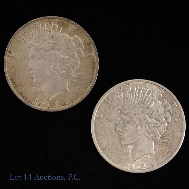 1923 & 1925 Silver Peace Dollars (2): 1923 and 1925 silver peace dollars (Philadelphia Mint). Metal is 90% silver and weighs 26.73 grams (ASW 0.7734 ozt.) each coin. Mintage is 30.8 million and 10.2 million respectively. *** Lot 14 Auctio
