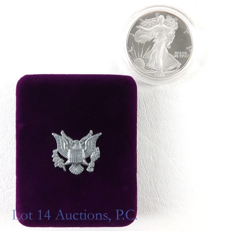 1986-S American Silver Eagle $1 Bullion Coin: 1986-S American silver eagle dollar bullion coin in OGP (purple case) with U.S. Mint's COA (San Francisco Mint). First year of issue. Metal is 99.9% silver and weighs 31.107 grams (one troy ounce). Ve