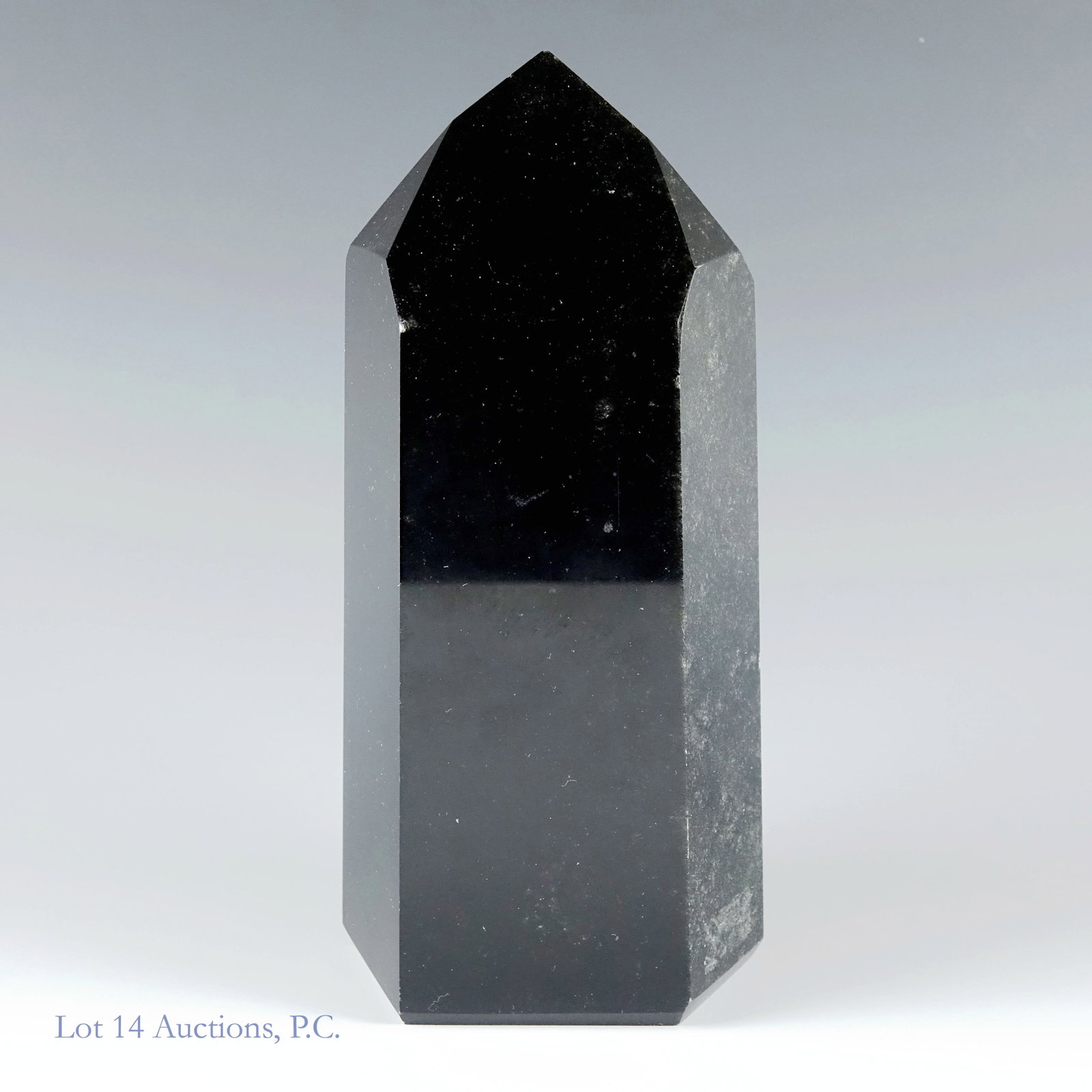 Black Quartz Crystal / Obsidian Tower 7.75" 4 Lbs: Black Quartz Crystal or Obsidian Tower. 7.75" x 3.75" x 2.75" Black Quartz Crystal or Obsidian weighing 4.01 lb (1818g). Small chips on edges, sticker residue. Please see photos for details on conditi