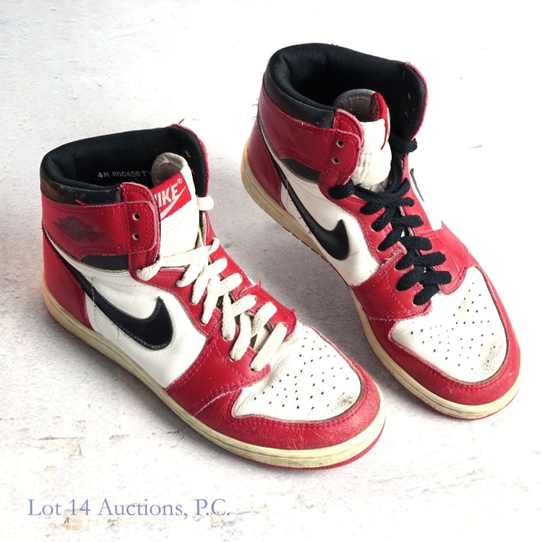 1985 Nike Air Jordan I OG Sneakers (Size 4.5): 1985 Nike Air Jordan I OG NBA Basketball Shoes / Sneakers (Men's Size 4.5) (Red-White Colorway) (Made In South Korea). Designed by Peter Moore, Tinker Hatfield & Bruce Kilgore. Released in April 1985.