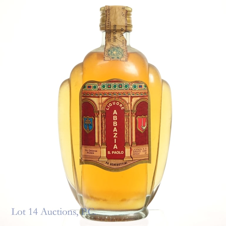 S. Paolo Abbazia Liquore (Italian Export): S. Paolo Abbazia PP. Benedettini Liquore, 84 Proof, 500 ml, Italian export bottle. Tax strip torn and frayed at the edges but intact overall. Slight peeling to corners of front label.