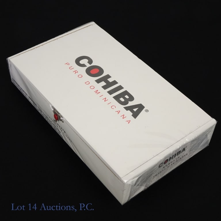 Cohiba Puro Dominicana Churchill Cigar (25 Pack): Cohiba Puro Dominicana Churchill Cigars, 7"x49, Pack of 25 sealed in wooden case. Wrapper: Habano, Origin: Dominican Republic. Consignor stored these cigars since original purchase in a humidity-contr