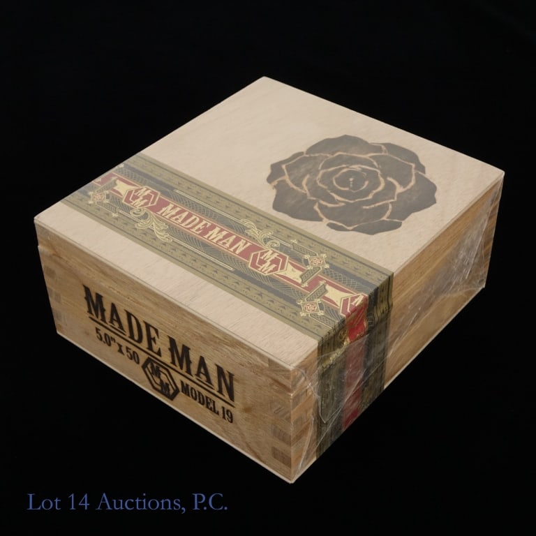 Made Man Model 19 Robusto Cigars (18 Pack): Made Man Model 19 Robusto Cigars, 5" x 50, Pack of 18, Wrapper: Corojo, Origin: Nicaragua, sealed in wooden box. Consignor stored these cigars since original purchase in a humidity-controlled humidor,