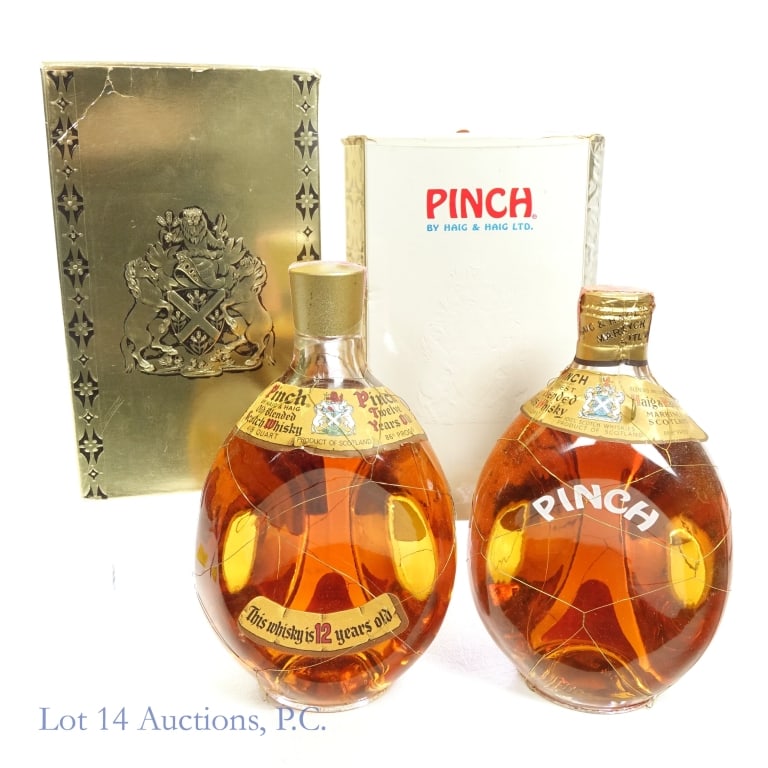 1960s/1970s Haig & Haig Pinch Blended Scotch (2): 2 bottles total in this lot. 1-Haig & Haig Pinch 12 Year Blended Scotch, 86 Proof, 4/5 Quart, early 1960s-late 1960s bottling. Tax strip in good condition with little to no tearing and only minor crea