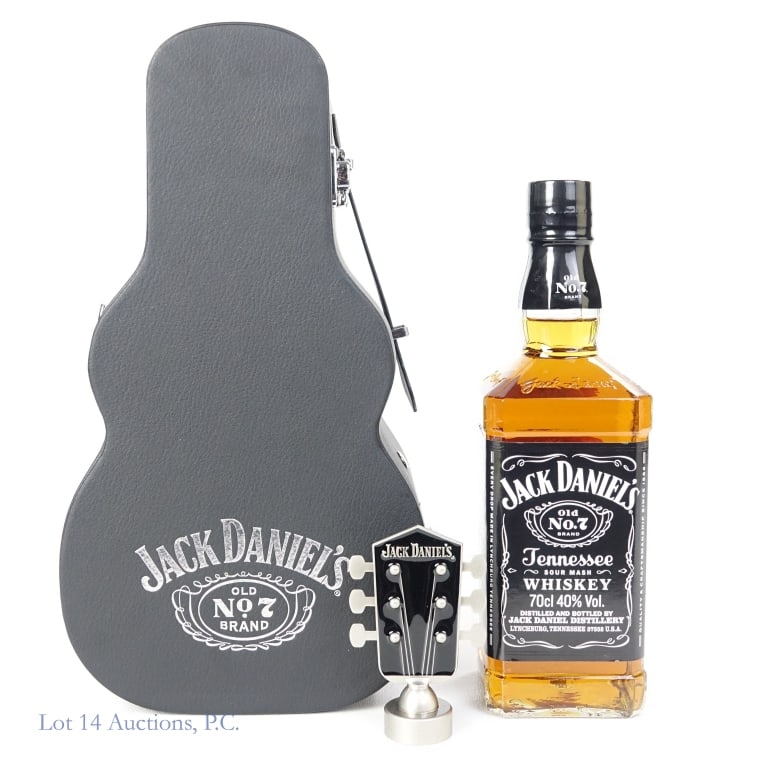 Jack Daniel's Whiskey Guitar Case Gift Set: Jack Daniel's Tennessee Whiskey, 80 Proof, 700 ml, Czech Republic Export. Gift Set includes a limited edition Jack Daniel's bottle stopper and the Jack Daniel's guitar case to hold full set.