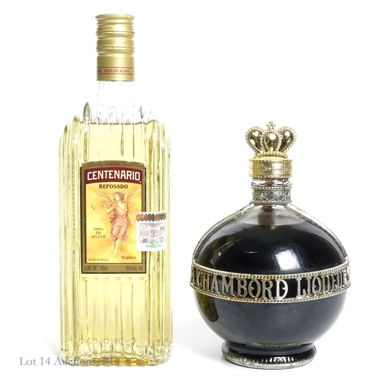 Centenario Reposado Tequila & Chambord Liqueur (2): 2 bottles total in this lot. 1-Centenario Reposado Tequila, 70 Proof, 700 ml. 2-Chambord Liqueur, 33 Proof, bottle size unknown, estimated to be 1980s bottling. Tax strip torn through and bottle is te