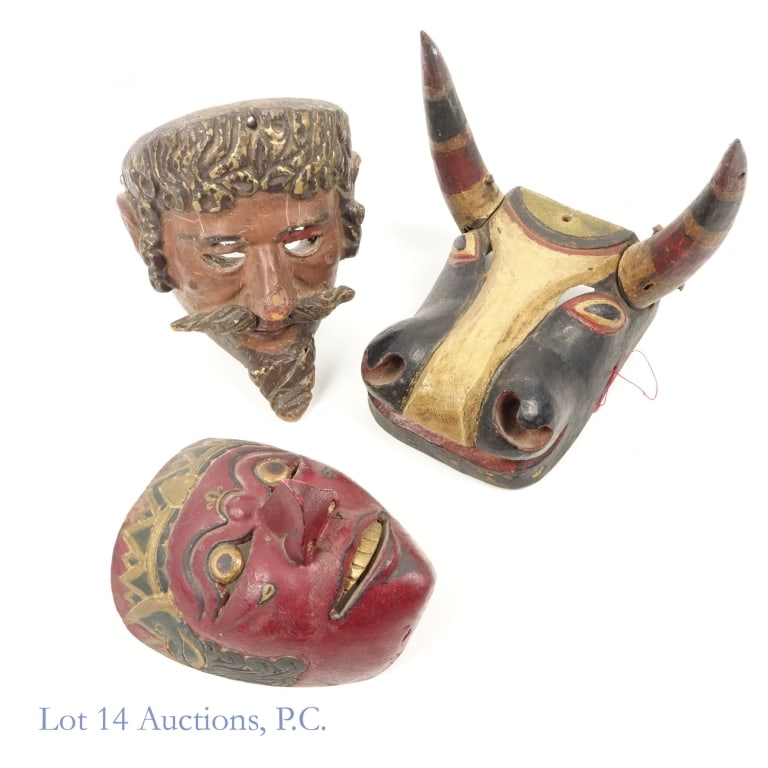 Indonesian & Guatemalan Wood Masks (3): Indonesian & Guatemalan Wood Masks (3). A trio of traditional wood carved masks from Indonesia and Guatemala circa late 19th century. Sizes range from 7.5" - 8.5". Guatemalan Torito. Guatemalan Conqui