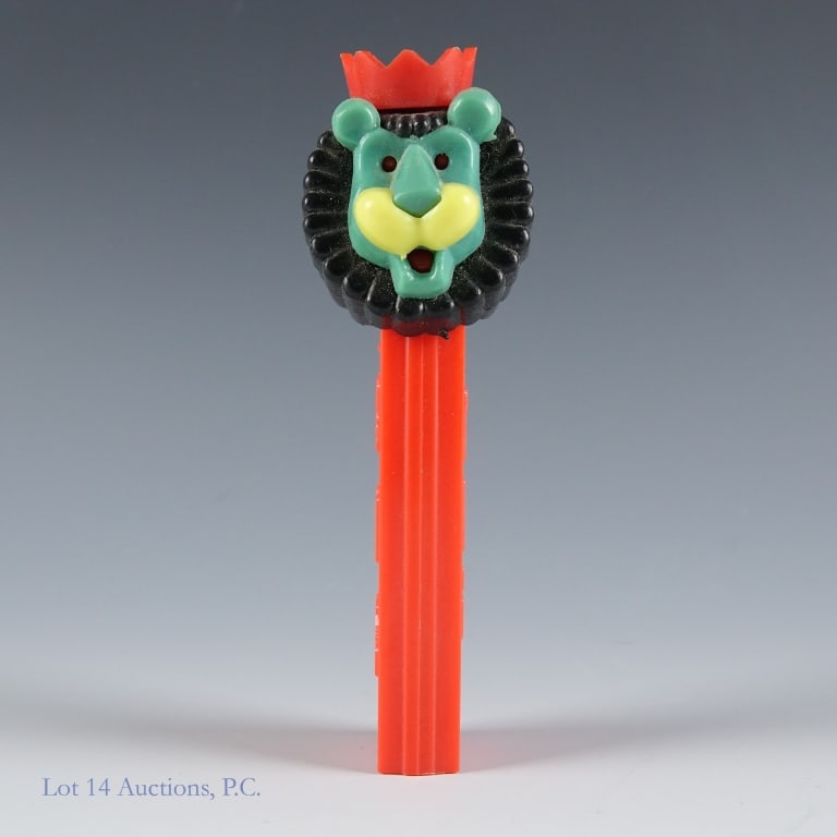 PEZ Dispenser, Roar the Lion, 3.4, Austria: PEZ Dispenser, Roar the Lion, 3.4, Austria PEZ Roar the Lion, #3.410.455, Made in Austria, Red stem, Red Crown, Green Face, Spring working, Head stable, No feet, Small scratches on stem. See photos fo
