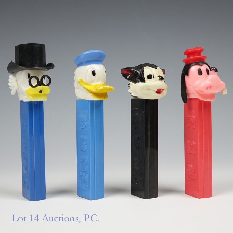 PEZ, Lil Bad Wolf, Goofy, Donald, Scrooge (4): PEZ, Lil Bad Wolf, Goofy, Donald, Scrooge, 2.6-3.9 (4). Collection of Walt Disney PEZ dispensers. Unless otherwise noted all dispensers: No feet, working springs, stable heads, Made in Austria. Lil Ba