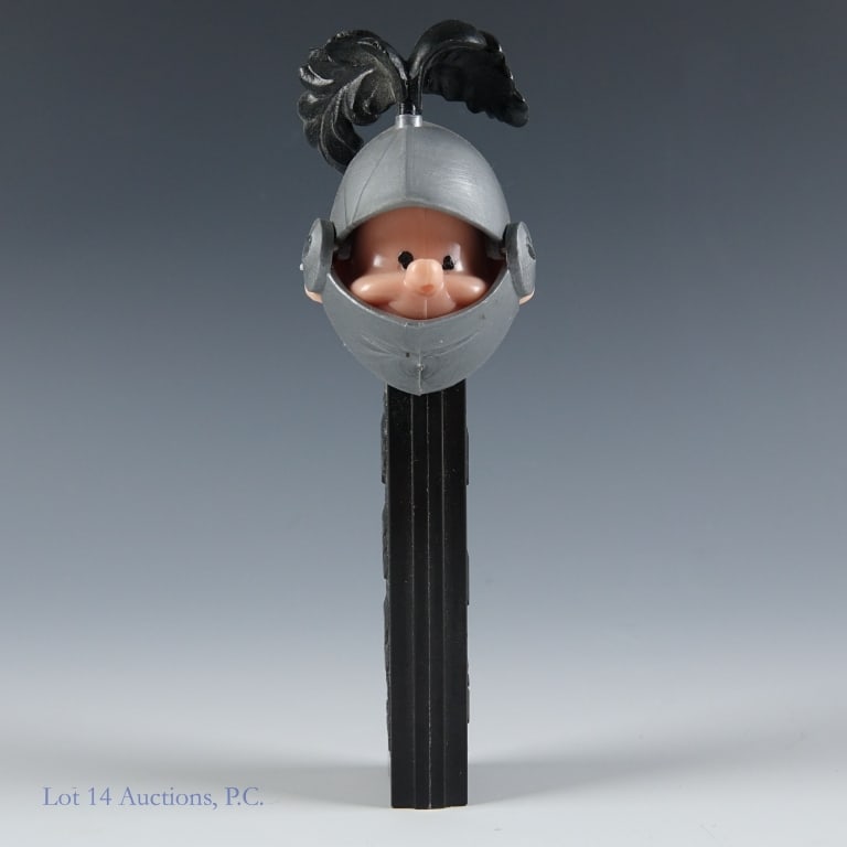 PEZ Dispenser, Knight, 3.4, Austria: PEZ Dispenser, Knight, 3.4, Austria PEZ Knight, Silver mask, Black plume, #3.410.455; Made in Austria; Black Stem; Spring working; Head stable; No feet. See photos for more details on condition. There