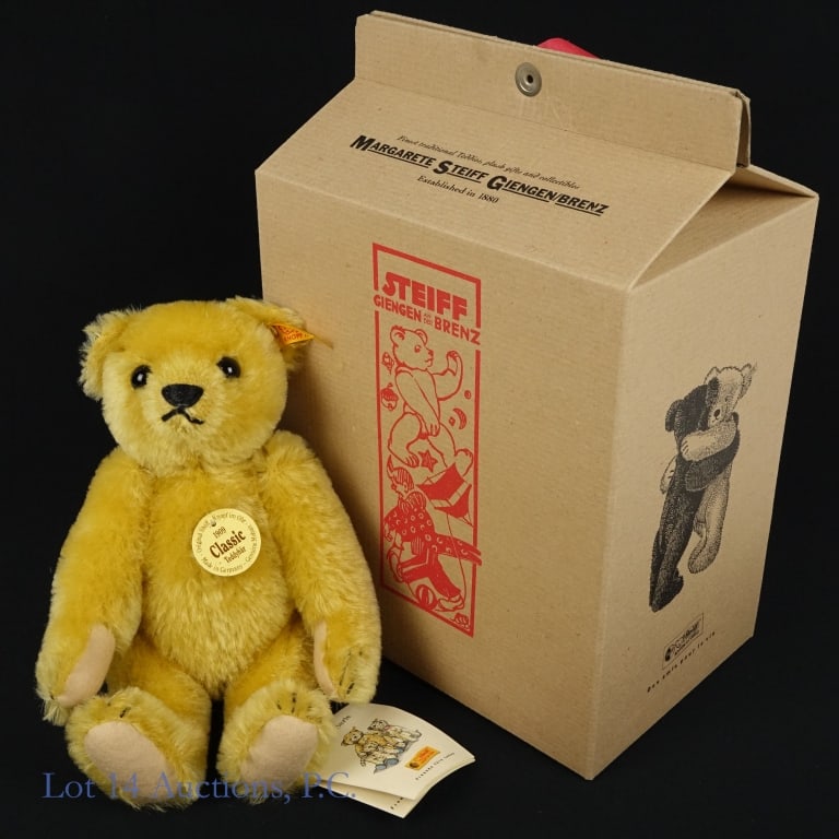 Steiff "1909 Classic" Teddy Bar: Modern remake of the 1909 Classic Mararete Steiff teddy bear. Color: yellow. Articulable arms and legs. Approximately 9.5" tall. All original tags, including ear tag, are present and intact. Comes in