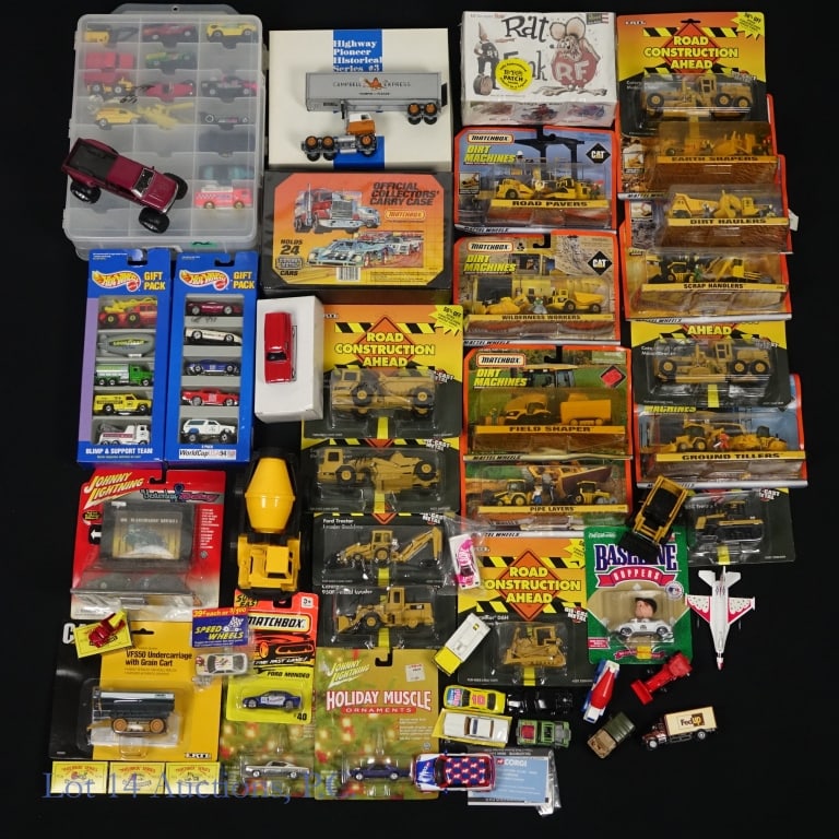 Die Cast Matchbox, Ertl, Some NIB (+40): Die Cast Matchbox, Ertl, Some NIB (+40). Lot of die-cast items from assorted manufacturers including Matchbox, Ertl, Johnny Lightning and more. Many items NIB. Varying states of wear and tear apparent