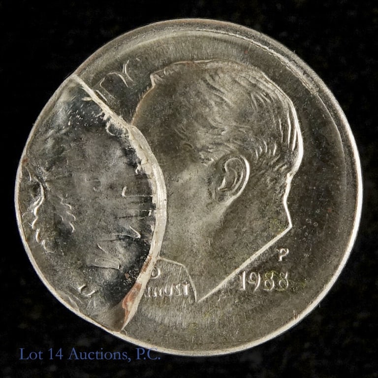 1988-P Roosevelt 10c Chain Strike Error (GEM BU): 1988-P United States clad Roosevelt dime (Philadelphia Mint). Designer John R. Sinnock. Per consigner, chain strike error that grades GEM BU. A chain strike error with obverse indent from another stru