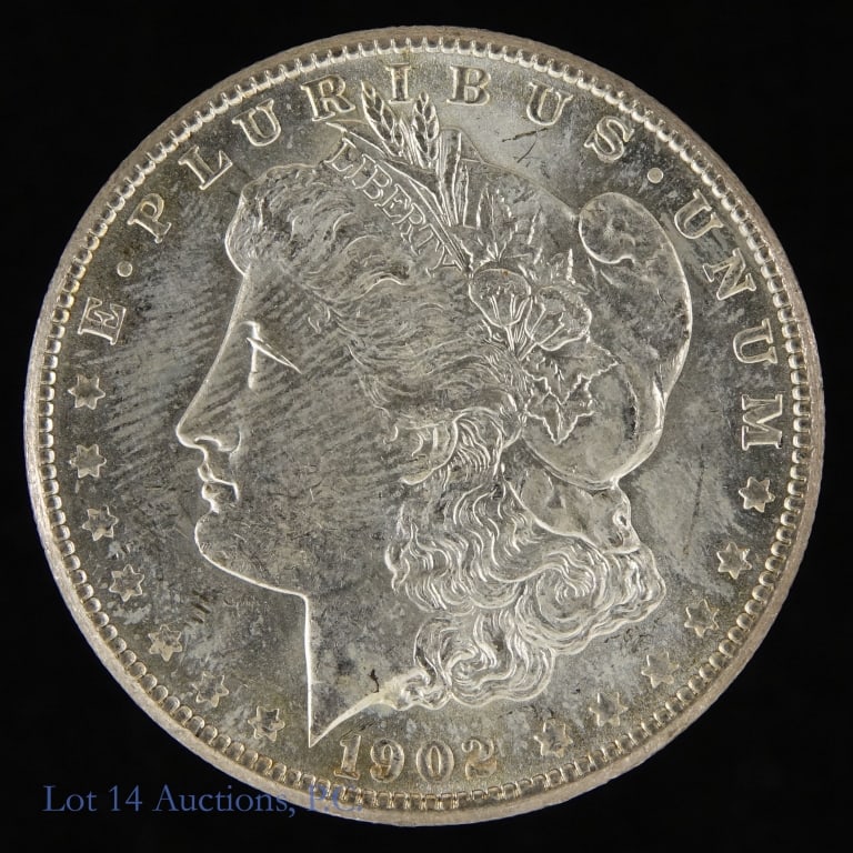 1902-O USA Silver Morgan Dollar (BU): 1902-O United States silver Morgan dollar (New Orleans Mint). Designer George T. Morgan. Per consigner, grades BU with good luster. Metal is 90% silver, weighs 26.73 grams and diameter measures 38.1 m