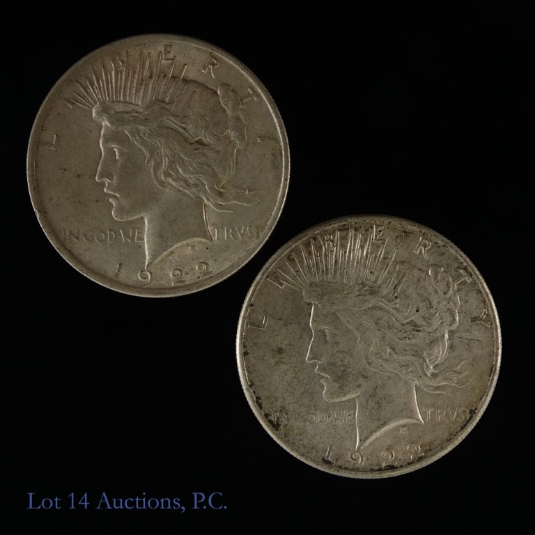 1922 P & D USA Silver Peace Dollars (2): 1922 P and D USA silver peace dollars (Philadelphia, Denver Mints). Designer is Anthony de Francisci. Metal is 90% silver, weighs 26.73 grams and diameter measures 38.1 mm each coin. ***Lot 14 Auction