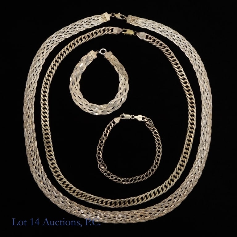 Sterling Silver Necklaces (2) & Bracelets (2): 2 necklaces & 2 bracelets. 1 necklace and 1 bracelet are a flat braided design. Both pieces are marked "925" and "Italy". The bracelet is additionally marked "fmc". Necklace is approximately 23.75" lo