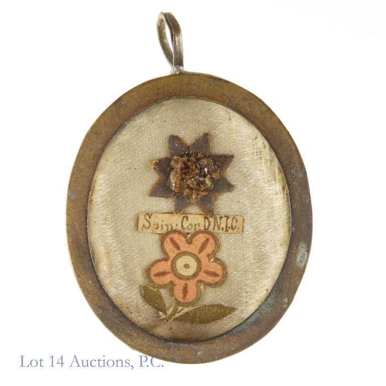 Catholic Reliquary - Spinae Coronae DNJC: Roman Catholic reliquary / relic. Contents labeled "Spin Cor D.N.J.C." (Crown of Thorns from "Our Lord Jesus Christ". Brass theca. Wax seal and threads intact. 1-1/16" x 1.25".